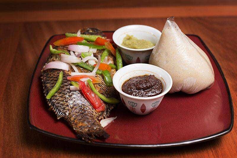 A Taste of Ghana: Mastering the Art of Banku and Grilled Tilapia | by Amen  Gbeblewu and Augustina Acquah | Medium