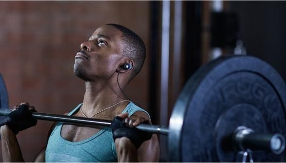 Why Do Gym People Wear Headphones? Surprising Reasons Revealed