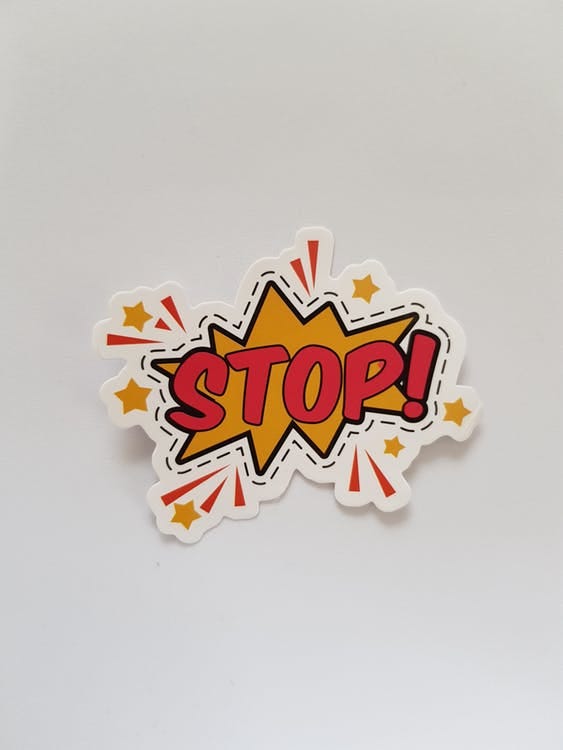 A comic style bang shape with the word ‘STOP!’ in the middle