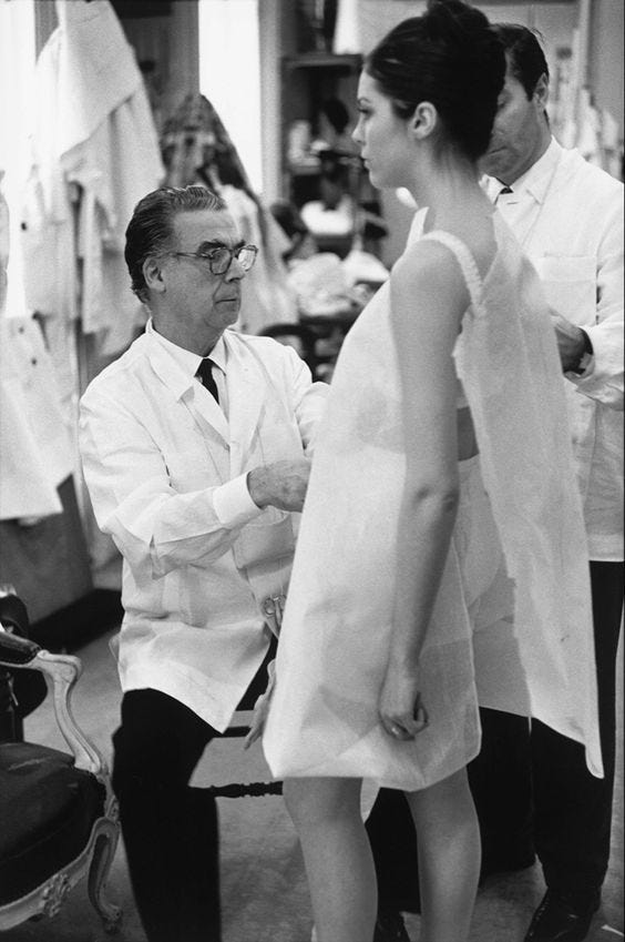 the sack dress was introduced by which designer in 1957 What was the inspiration behind Cristobal Balenciaga's sack dress design?