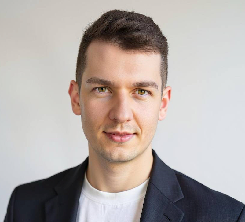 Artem Lajko speaking at conference