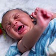 why does newborn baby cry so much?