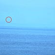 Saucer Shaped Object Captured Entering The Sea,