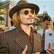 You’ve Got It Wrong — Johnny Depp Isn’t Trying To Win