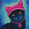 Силуэт черной кошки в розовой шляпе