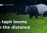 A tapir looms in the distance