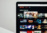 Netflix will offer discounted, ad-supported option