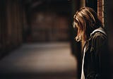 What is the relationship between domestic abuse and football?