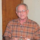 John P Romansic