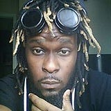 Dread-Head Ronnie Aristide