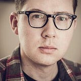 Aaron J Scott