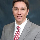 Brian E. Thomas