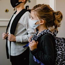 Why Vaccinated Teachers and Students Should Continue Using Masks