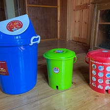 Three colored waste bins: A trial for behavioral insight