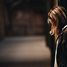 What is the relationship between domestic abuse and football?