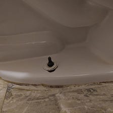 A Karen cogs her toilet, and how to replace one.