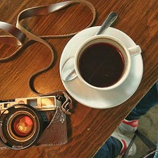 Coffee, Camera, and Sneakers.