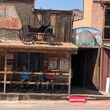 On Route 66, A Cowboy Rides Into A Dusty Town