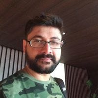 Rajveen K