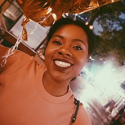 Simi E.