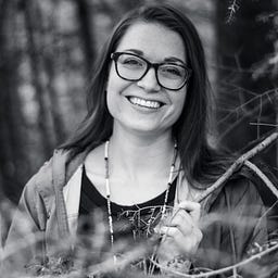 Emily M Swope