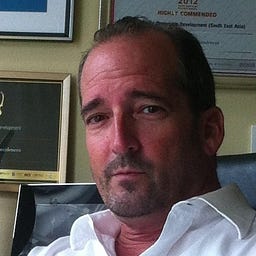 Michael J Aumock