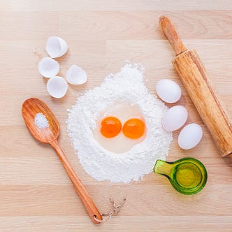Cooking implements, flour and eggs