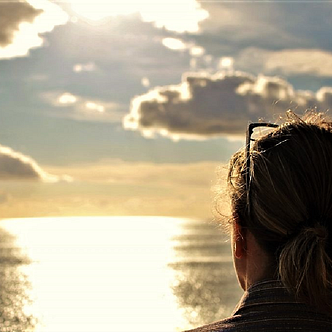 A woman looking out to sea