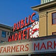 The sign welcoming visitors to Pike Place Market in Seattle.