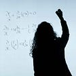 Sillouhette of a woman writing calculus formulas on a white board.