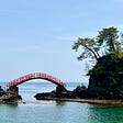 Arched bridge between islands near Shukunegi.