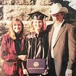The author, center, with her parents at her college graduation.