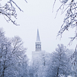 Church steeple on snowy day
