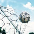 Soccer ball goes inside the net
