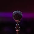 Microphone with purple background.