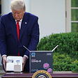 President Trump Displays Abbott’s 5 minute test. (Mandel Ngan/AFP via Getty Images)