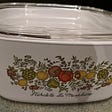 A Vintage Casserole Spice of Life pattern, Corning Ware with Pyrex lid