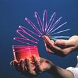 Image result for image of slinky in hand