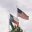 The Texas Flag Behind The US Flag