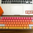 A laptop with Npm logo.