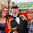 Town Crier poses with two women