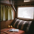 pillowed seating area near window