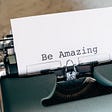 Paper on Typewriter saying ‘Be Amazing’