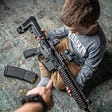 Young child with AR-15
