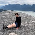 L-sits on top of Stawamus Chief. BC, Canada. June 2022.