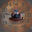 Person sitting on top of an image of a clock
