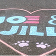 twitter header for Major and Champ, the new dogs in the whitehouse, a heart with joe and jill on it chalked on the ground