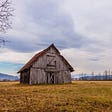 A barn in a field
