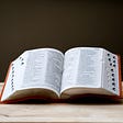 A large hardbound dictionary opened and displayed