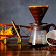 model airplane and coffee maker with pot